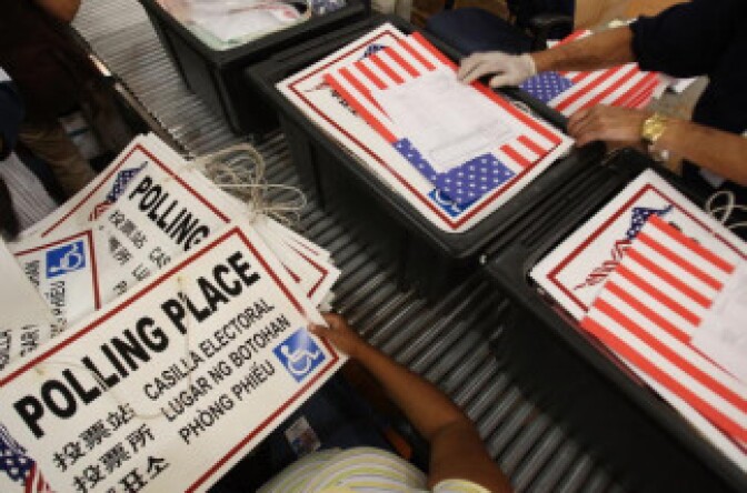 Workers at the Los Angeles County Registrar-Recorder County Elections Operations Center pack materials to be delivered to polling places into ballot boxes on October 23, 2008 in the Los Angeles-area community of Santa Fe Springs, California.