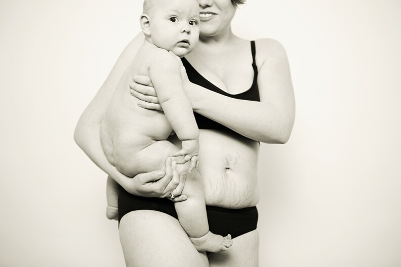 The beautiful, Danielle Szymanski, with 4 month old Eleanor Ophelia. Danielle had very comfortable pregnancy and had planned for a natural hospital birth. After laboring for a very long time and becoming preeclamptic, however, she had to have a cesarean. Thankfully, Eleanor was born healthy and Danielle was able to initiate breastfeeding. After a couple weeks at home, Danielle fainted, convulsed and had to be taken to hospital. Due to tests they were running she was unable to nurse for a short period of time. Her doula stepped in to wet nurse temporarily and she was able to get donor milk as well to carry her through. They never determined what had happened to Danielle but she hasn’t had any episodes since.