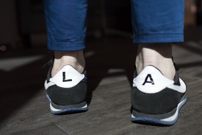 Executive Chef Vartan Abgaryan wears shoes representing Los Angeles at 71 Above, the new restaurant on the 71st floor of the U.S. Bank Tower in downtown Los Angeles, on Thursday afternoon, Sept. 22, 2016.