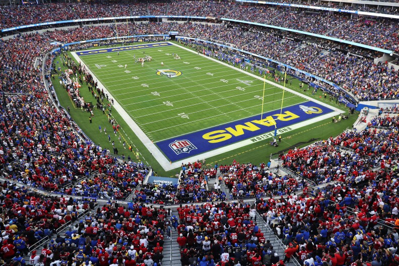 Red 49er jerseys seems to more plentiful than the Rams hometown blue in this upper deck show of the crowd and field.