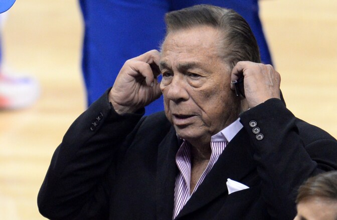 Caption:Los Angeles Clippers owner Donald Sterling attends the NBA playoff game between the Clippers and the Golden State Warriors, April 21, 2014 at Staples Center in Los Angeles, California. NBA Commissioner Adam Silver said April 26 that the NBA is investigating Sterling for alleged racist comments. AFP PHOTO / ROBYN BECK (Photo credit should read ROBYN BECK/AFP/Getty Images)
