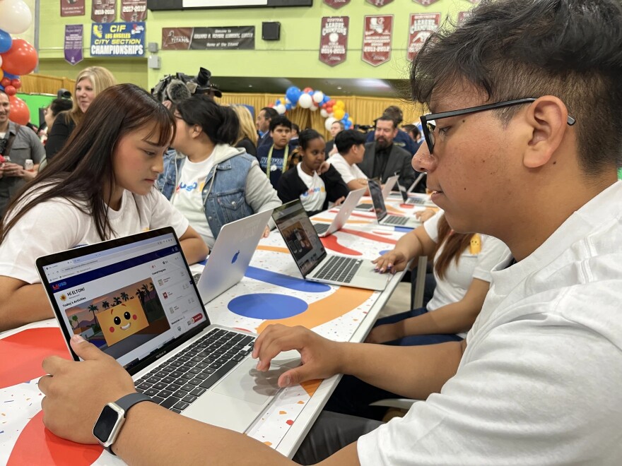 Two high school seniors test out LAUSD's new AI platform "Ed" at the Edward R. Roybal Learning Center.