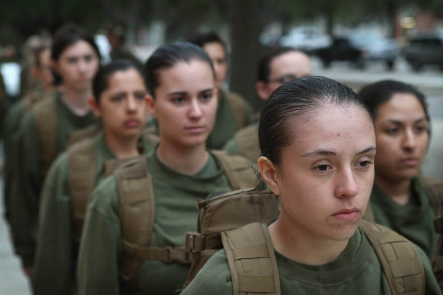 PARRIS ISLAND, SC - FEBRUARY 25:  Female Marine recruits stand in formation during boot camp February 25, 2013 at MCRD Parris Island, South Carolina. All female enlisted Marines and male Marines who were living east of the Mississippi River when they were recruited attend boot camp at Parris Island. About six percent of enlisted Marines are female.  (Photo by Scott Olson/Getty Images)