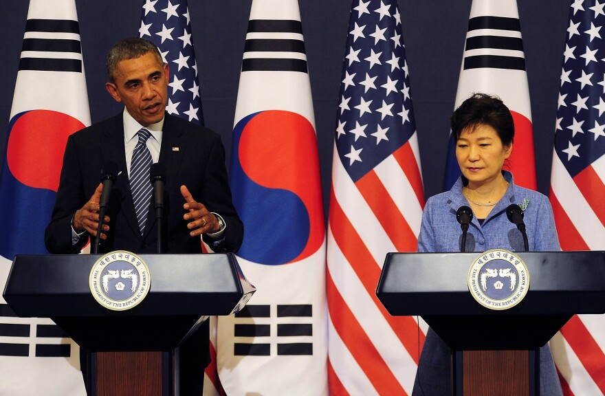 US President Barack Obama (L) and South Korean President Park Geun-Hye (R) attend a joint press conference at the presidential Bule House on April 25, 2014 in Seoul, South Korea. The U.S. President is on an Asian tour where he is due to visit Japan, South Korea, Malaysia and Philippines.   