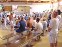 Men watch television in a recreation area at Solano Prison.