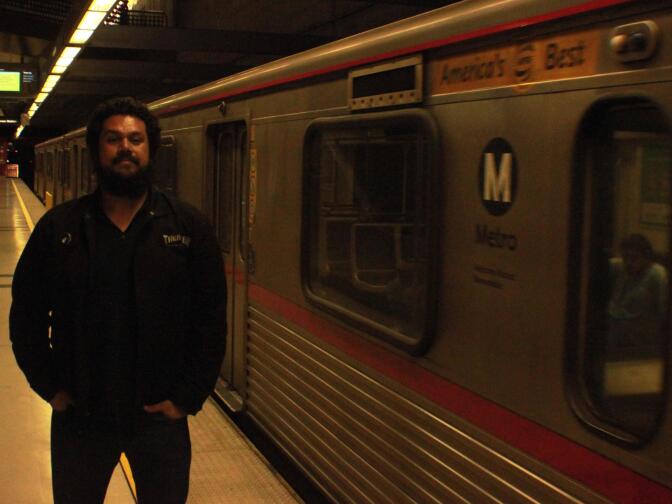 Boyle Height’s punk rocker and public transportation advocate Eddie Solis with his beloved Red Line. 