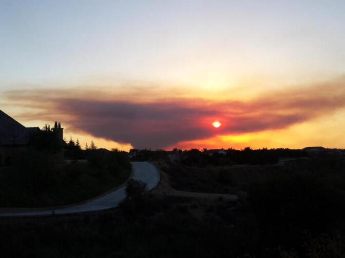 A wildfire broke out near a dam in Riverside County Saturday.