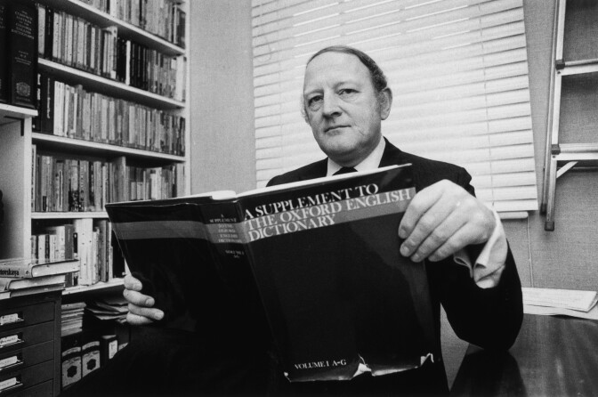 English writer and broadcaster Robert Robinson holding the first volume of 'A Supplement To The Oxford English Dictionary', 24th March 1977 — long before Wikipedia and Wiktionary put the practice of curating language and knowledge in the hands of the Internet-connected masses and before words like "selfie" and "cray" came to be formally added to dictionaries in just a few short years.