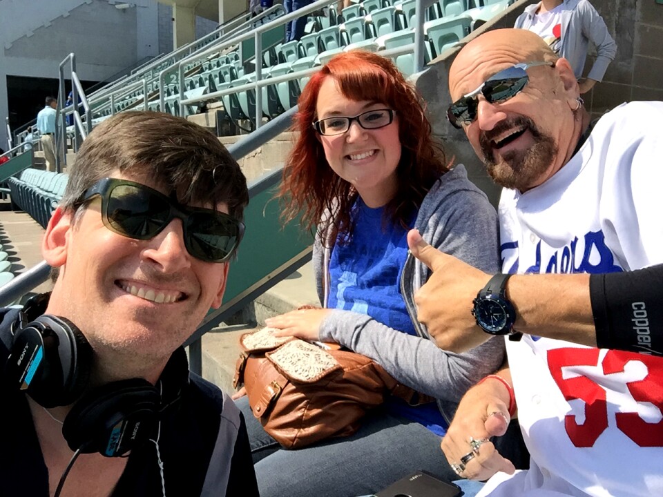 KPCC's John Rabe with Shanna (Santa Clarita) and her dad Mark (Lancaster), longtime Dodger fans who have seats in the nosebleed section and were checking them out at 11am Tuesday - two hours before the first pitch.