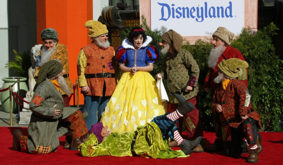 Snow White and the Seven Dwarfs perform during the handprint ceremony at Grauman's Chinese Theatre on February 5, 2004 in Hollywood, California.