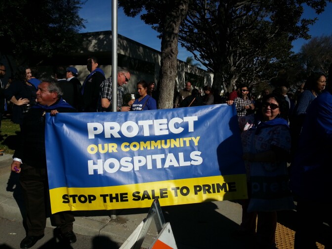 Members of SEIU United Health Workers West opposed to the sale of the Daughters of Charity Hospitals to Prime Healthcare rally outside of Monday's public hearing in Lynwood.