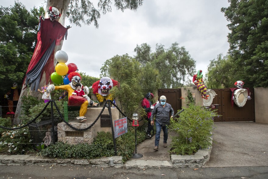 Clown themed Halloween decorations are located outside the entrance to a home on Crescenda Dr. in Brentwood.