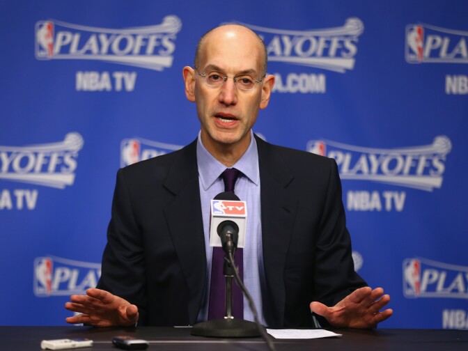 MEMPHIS, TN - APRIL 26:  Adam Silver the NBA Commissioner talks to the media before the start of the Oklahoma City Thunder game against the Memphis Grizzlies in Game 4 of the Western Conference Quarterfinals during the 2014 NBA Playoffs at FedExForum on April 26, 2014 in Memphis, Tennessee. NOTE TO USER: User expressly acknowledges and agrees that, by downloading and or using this photograph, User is consenting to the terms and conditions of the Getty Images License Agreement.  (Photo by Andy Lyons/Getty Images)