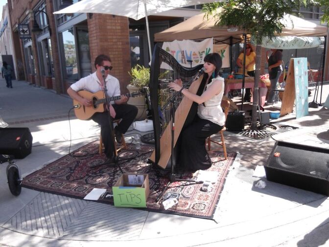 A harpist and guitarist serenate the crowd at Patchwork.