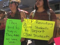 Students and faculty protest U.S. Border Patrol recruiters at Cal State Northridge.