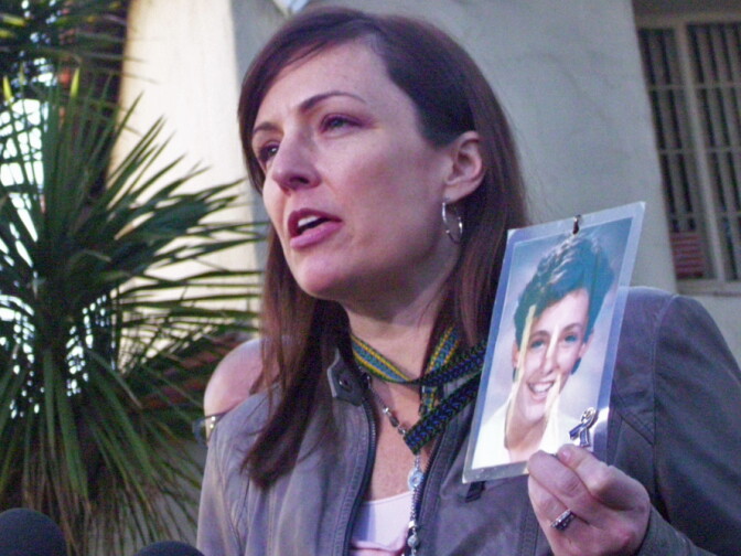 Survivors Network for those Abused by Priests (SNAP) regional director Joelle Castiex calling on Cardinal Roger Mahony not to attend the papal conclave, Saturday, Feb. 23, 2013. She herself was abused by a priest as a child.