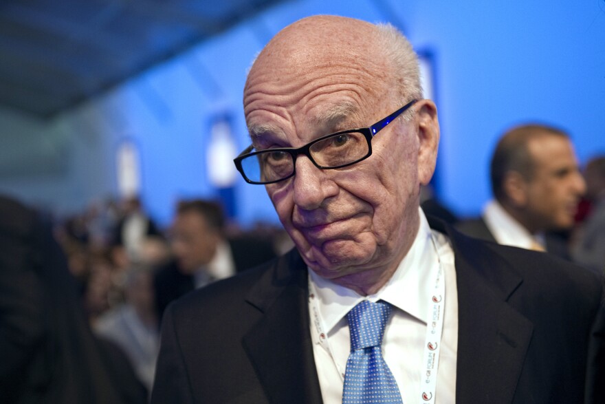 File: Rupert Murdoch, chairman and CEO of News Corporation, attends the e-G8 meeting gathering Internet and information technologies leaders and experts at the Tuileries gardens in Paris on May 24, 2011.