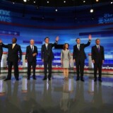 Republican presidential candidates  take the stage for a debate in the Stephens Auditorium at Iowa State University August 11, 2011 in Ames, Iowa.