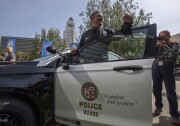 LOS ANGELES, CA - APRIL 10: LAPD Chief Charlie Beck stands at one of two new Ford Fusion hybrid pursuit-rated Police Responder cars unveiled at Los Angeles Police Department headquarters on April 10, 2017 in Los Angeles, California. The LAPD is committed to purchasing at least 300 hybrid and hybrid-electric plug-in vehicles by 2020.  (Photo by David McNew/Getty Images)