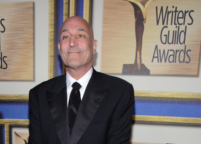 FILE - In this Feb. 1, 2014 file photo, Sam Simon arrives at the Writers Guild Awards, in Los Angeles. Simon, a co-creator of "The Simpsons" who made a midlife career shift into philanthropy and channeled much of his personal fortune into social causes including animal welfare, has died Sunday, March 8, 2015, after a long bout with cancer.  He was 59. (Photo by Tonya Wise/Invision/AP, File)