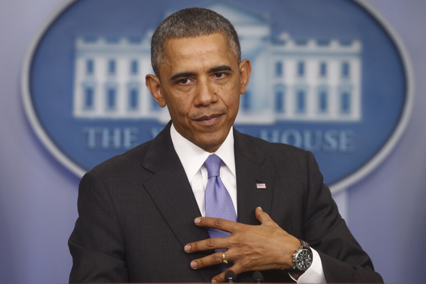 President Barack Obama speaks about his signature health care law, Thursday, Nov. 14, 2013, in the Brady Press Briefing Room of the White House in Washington. Bowing to pressure, President Barack Obama intends to permit continued sale of individual insurance plans that have been canceled because they failed to meet coverage standards under the health care law, officials said Thursday. (AP Photo/Charles Dharapak)