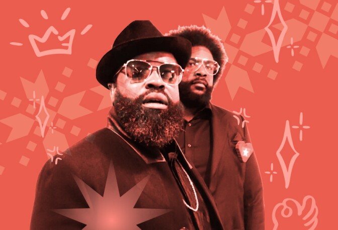 A black and white photo of two black men wearing suits and glasses 