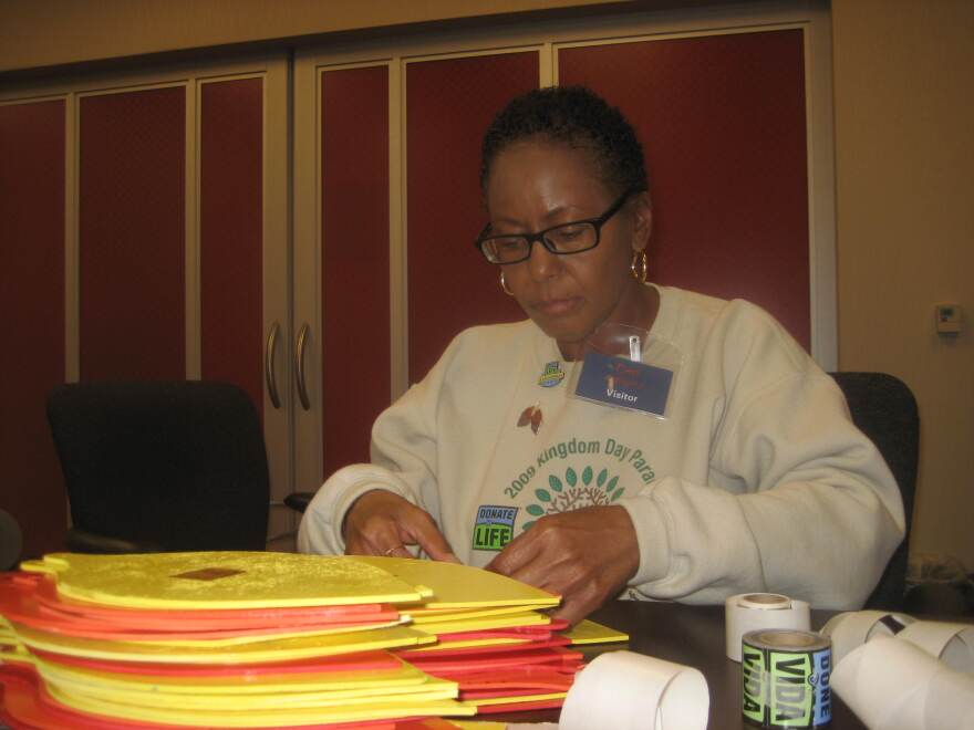 Double-lung transplant recipient Eunice Gibson works on leaves for the Donate Life float in the 2010 Kingdom Day Parade 