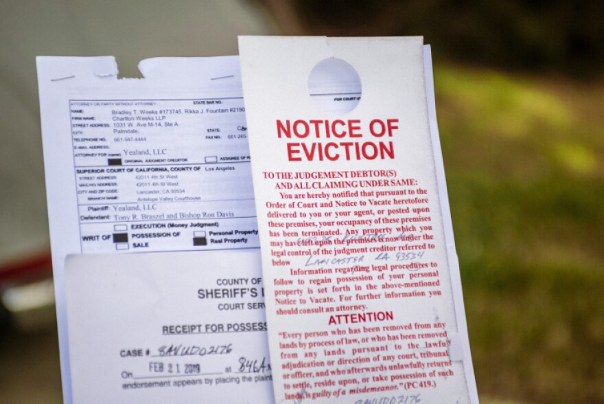 An eviction notice and paperwork.