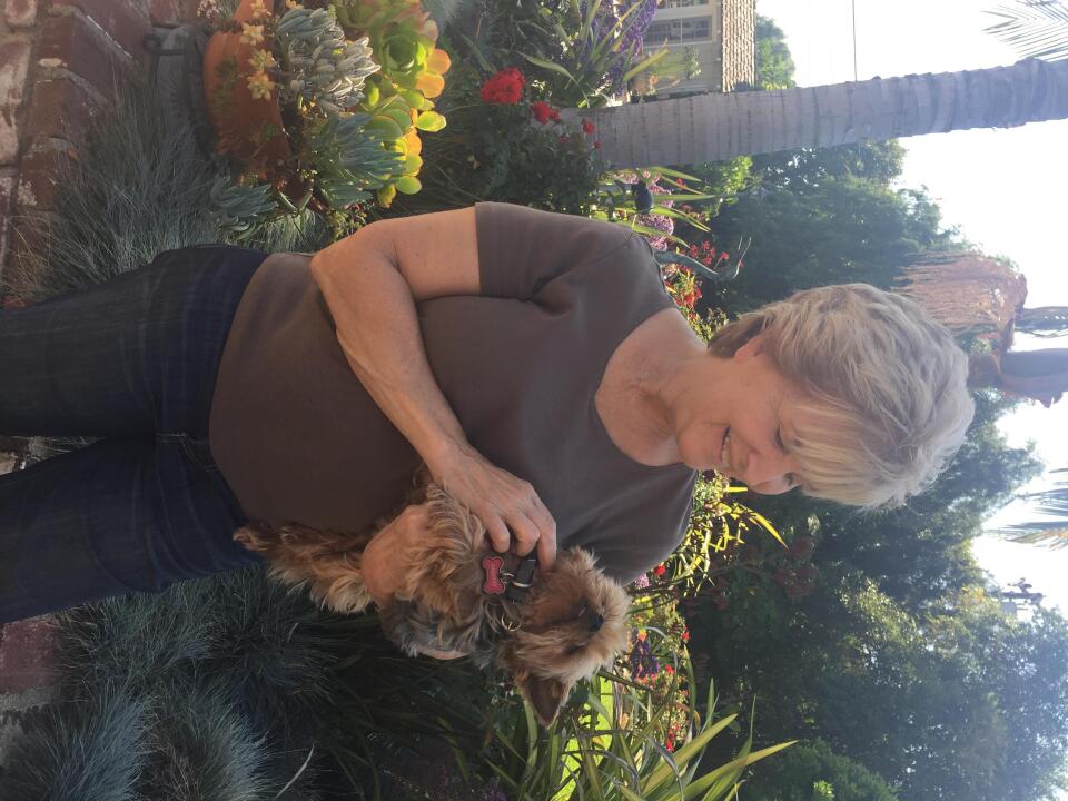 Donna Perez with her pet Yorkie, Cody. Her other dog was killed by a coyote in her backyard last fall.