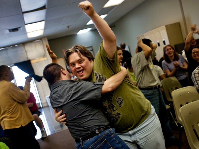 Nick Weiland celebrates after an energetic song during rehearsals on April 8. "Recovered: A Musical Journey" includes covers of songs that speak to what it's like to live with a developmental disability.