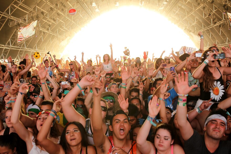Music fans attend day 3 of the 2014 Coachella Valley Music & Arts Festival at the Empire Polo Club on April 20, 2014 in Indio, California.  