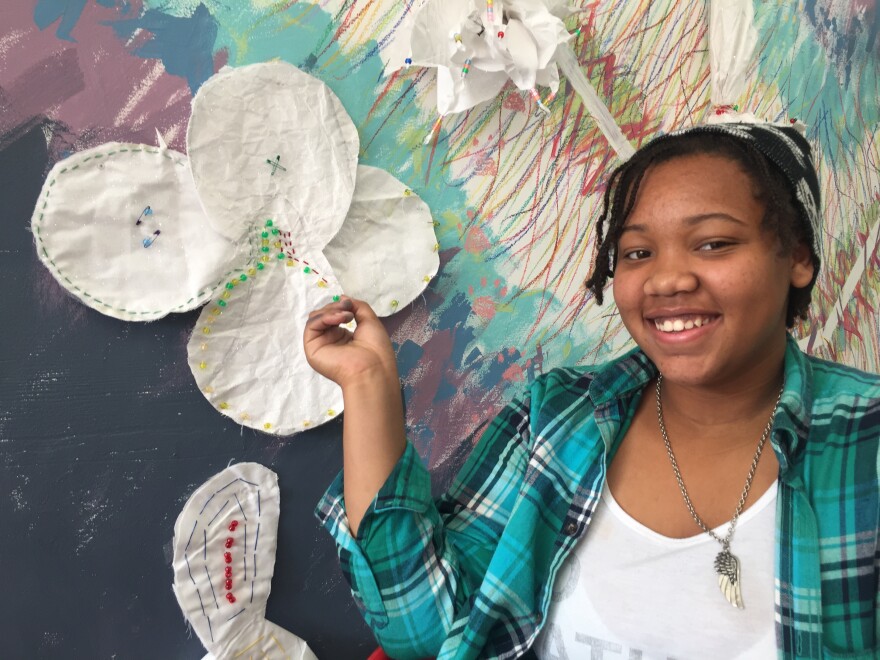 Eighth grader Deija Dukes said she was excited to talk to a practicing artist, and to have art displayed in a public exhibition.