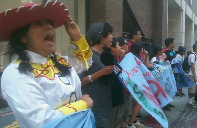 About 100 people protested against La Opinion President Monica Lozano for her role as a UC Regent and a member of the Disney board. Protestors urged Lozano to vote against upcoming student tuition hikes and to approve benefits for Disney hotel workers.