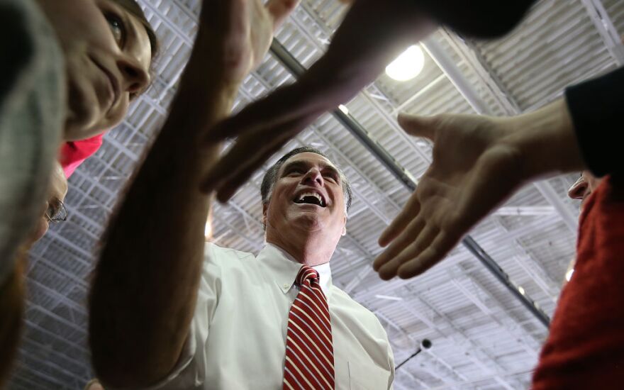 Republican presidential candidate, former Massachusetts Gov. Mitt Romney greets supporters during a campaign event at Integrity Windows on November 1, 2012 in Roanoke, Virginia. With less than one week to go until election day, Romney is campaigning in Virginia.  