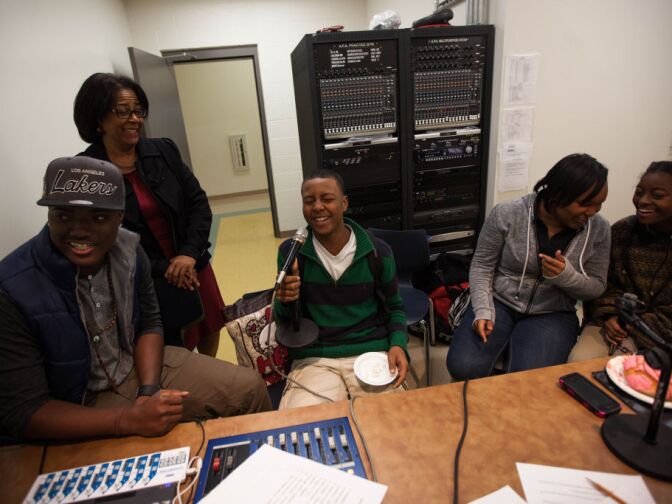 Councilwoman Jan Perry jokes with students from KSWG, the student-run radio station at South Regional High School #12.