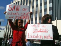 Public school educators from north Orange County protest to preserve education funding in front of the Fullerton offices of Republican state Assemblyman Chris Norby.