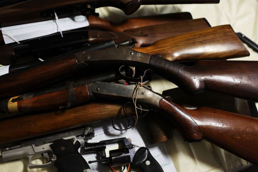 BRIDGEPORT, CT - DECEMBER 22: Pistols and rifles that have been turned in at a gun buyback event are viewed at the Bridgeport Police Department's Community Services Division on December 22, 2012 in Bridgeport, Connecticut. The buyback program, the largest in the city's history, will offer up to $200 value for a working handgun, $75 for a rifle and a higher rate of payment for a weapon determined to be an assault-type rifle. There was strong turnout for the event with many residents turning in guns they haven't used in years. Following the massacre of children and adults at a school in Newtown, Connecticut last week, numerous Connecticut towns and cities are trying to get more guns off the street.  (Photo by Spencer Platt/Getty Images)