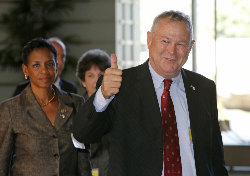 US Representative Dana Rohrabacher (R), (R-Calif.), gives a thumbs-up as his US congressional delegation arrives at the prime minister's official residence to meet Japan's Prime Minister Shinzo Abe in Tokyo on September 2, 2013. 