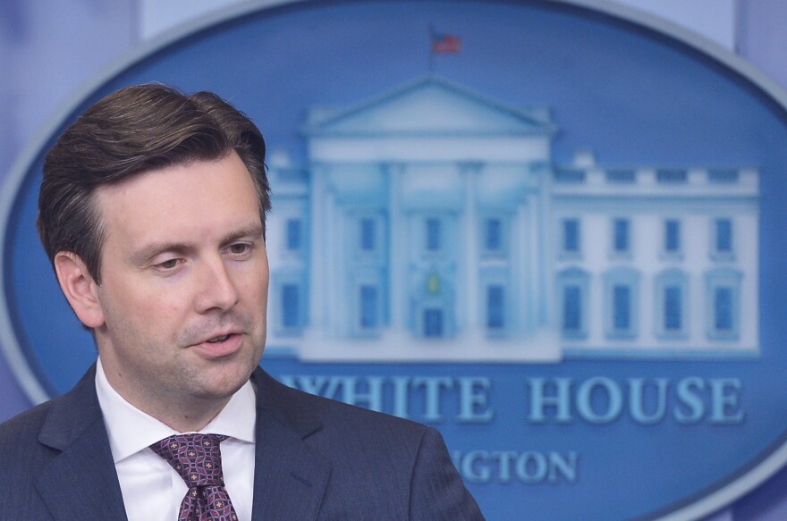 White House Press Secretary Josh Earnest answers questions on the massive cyber-attack on the personal data of government employees June 5, 2015 during the daily briefing in the Brady Briefing Room of the White House in Washington, DC. The US government on Thursday admitted hackers accessed the personal data of at least four million current and former federal employees, in a vast cyber-attack suspected to have originated in China. AFP PHOTO/Mandel NGAN        (Photo credit should read MANDEL NGAN/AFP/Getty Images)