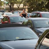 WASHINGTON, DC - AUGUST 23:  Drivers climb out of their cars to survey a traffic jam on 14th Street NW near the Ronald Reagan Building after a 5.8 magnitude earthquake rattled the East Coast August 23, 2011 in Washington, United States. The quake, centered near Miner, Virginia, rattled states from Maine to North Carolina but produced no serious injuries or damage.  (Photo by Chip Somodevilla/Getty Images)