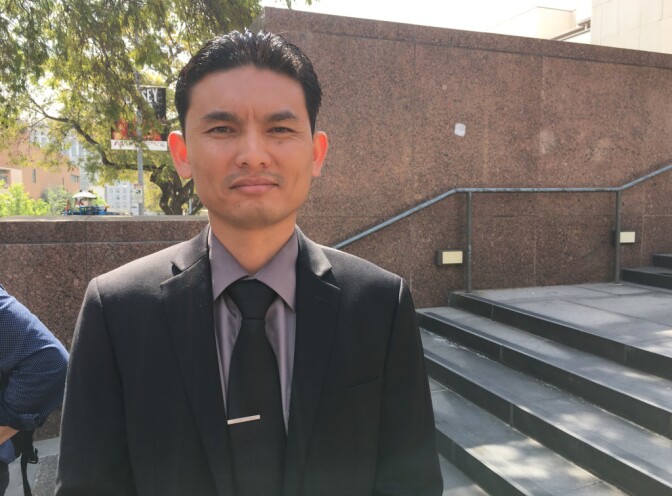 Phal Sok, 35, was among those who showed up Tuesday to protest a motion before the Los Angeles County Board of Supervisors that would place limits on which immigrants can access a legal defense fund for immigrants facing deportation, being set up partly with county funds. The motion, which was not voted on, would have excluded immigrants like Sok, who said he was convicted of armed robbery in his teens but is no longer a threat. He is facing deportation.