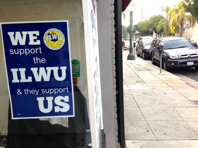About one in four people in San Pedro and the surrounding area either work for the union or retired from it, and most businesses have a sign supporting the ILWU in their window. 