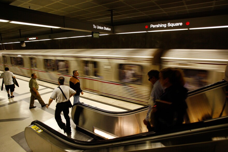 LOS ANGELES, CA - JUNE 03:  Passengers board Metrolink subway trains during rush hour on June 3, 2008 in Los Angeles, California. Skyrocketing gas prices are driving more commuters to take trains and buses to work instead of their cars. In the first three months of 2008, the number of trips taken on public transport in the US rose 3 percent to 2.6 billion, creating pressures on some transportation systems to cope with increasing ridership. Transit officials in southern California and elsewhere are now encouraging employers to stagger employee schedules to ease the rush hour crunch on trains and buses and Metrolink plans to add107 rail cars to its fleet of 155 as soon as next year.  (Photo by David McNew/Getty Images)
