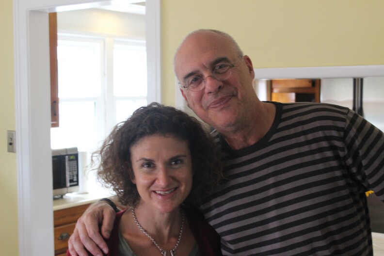 Alex Cohen and food critic Mark Bittman relax after working furiously in the kitchen 