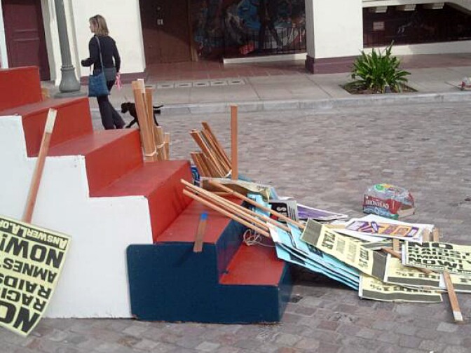 Leftover signs as immigration protesters move out in downtown L.A., Dec. 15, 2011.
