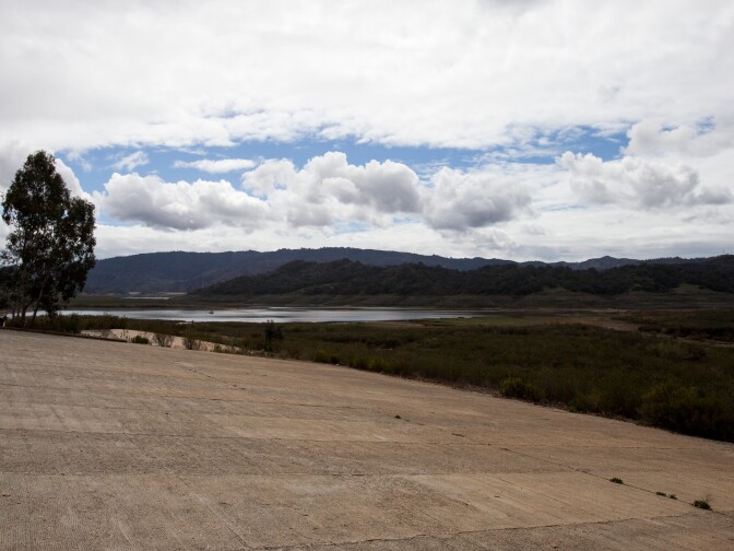 A boat ramp, which used to be submerged in Lake Casitas, now sits dry hundreds of yards from the edge of the water.