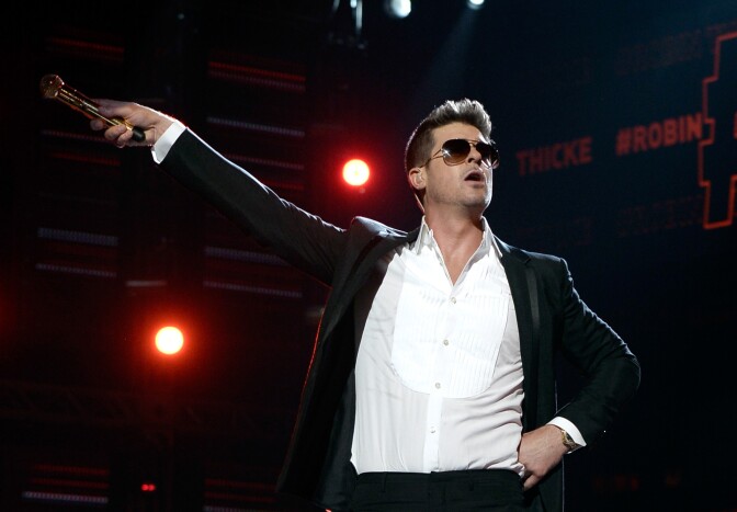 LOS ANGELES, CA - JUNE 30:  Singer Robin Thicke performs onstage during the 2013 BET Awards at Nokia Theatre L.A. Live on June 30, 2013 in Los Angeles, California.  (Photo by Kevin Winter/Getty Images for BET)