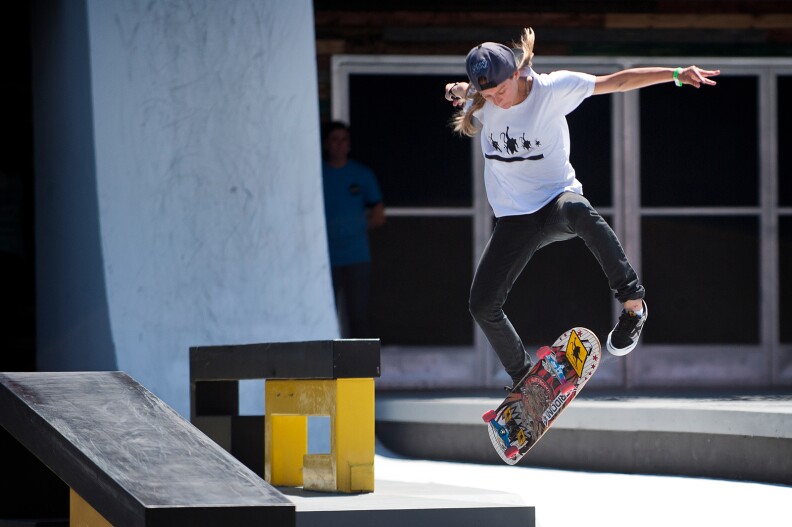 Skateboarder Jessica Florencio does a trick during the second heat of the Women's Skateboard Street competition during the X Games.