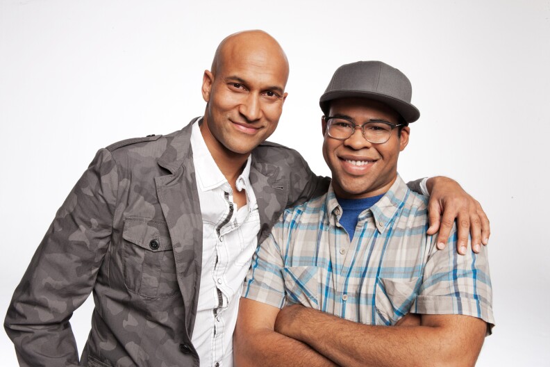 This undated image released by Comedy Central shows Keegan-Michael Key, left, and Jordan Peele from the sketch comedy series "Key & Peele." As guys who both lay claim to biracial status, they share a state of informed in-betweenness that gives their comedy extraordinary insight.  Race and culture fuel much of "Key & Peele," their sketch-and-standup half-hour airing Wednesdays at 10:30 p.m. EDT on Comedy Central. Straddling the great divide between White and Black, they are poised to bring their audience a special brand of laughs.  (AP Photo/Comedy Central, Ian White)