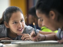 Fourth grader Apriell Lawton and her class map characteristics about themselves before making a self-portrait during the Classroom-in-Residence program at the Hammer Museum on Thursday, March 3, 2016.